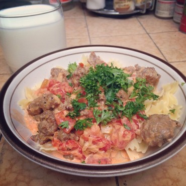 sausage, cream, tomatoes, with bowties